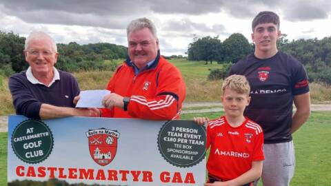 Joint main sponsor John Mullins of Amarenco presenting  a sponsorship cheque to Christy O'Sullivan, Chairman of the organising committee. Included are Cork senior hurler Ciarán Joyce - and James Bowens (representing the next generation of Castlemartyr players)
